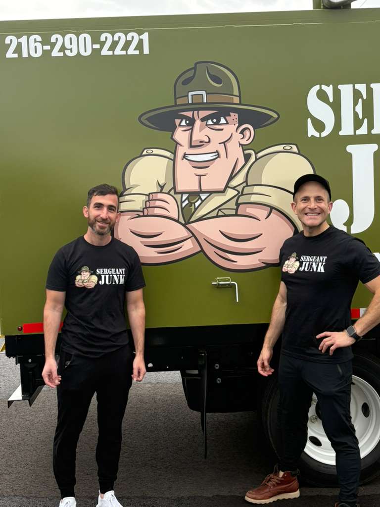 Sergeant Junk founders in front of the truck